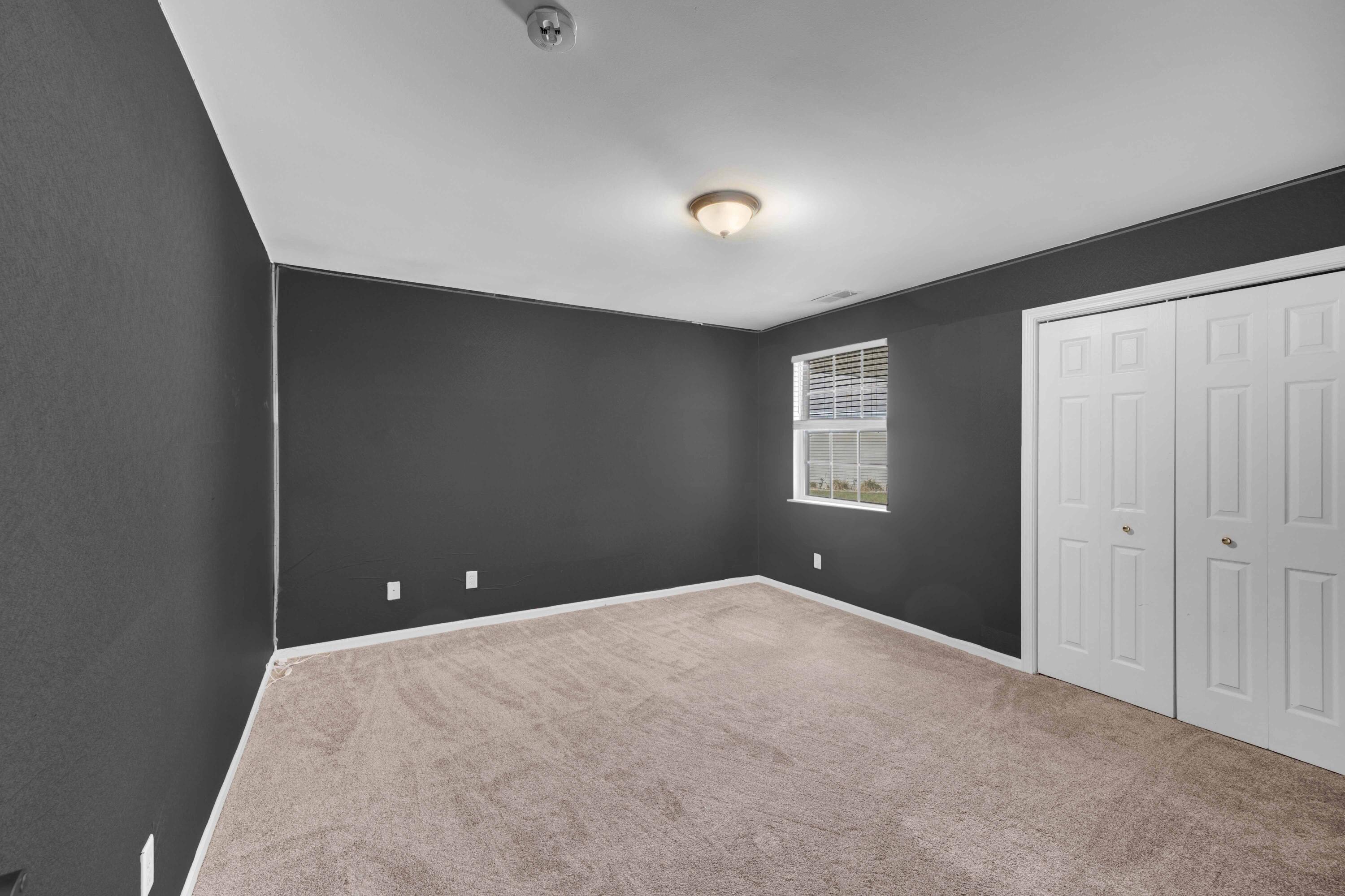 8461 Pierce Street Merrillville, IN 46410 - Photo 15 of 21 a view of an empty room with a window
