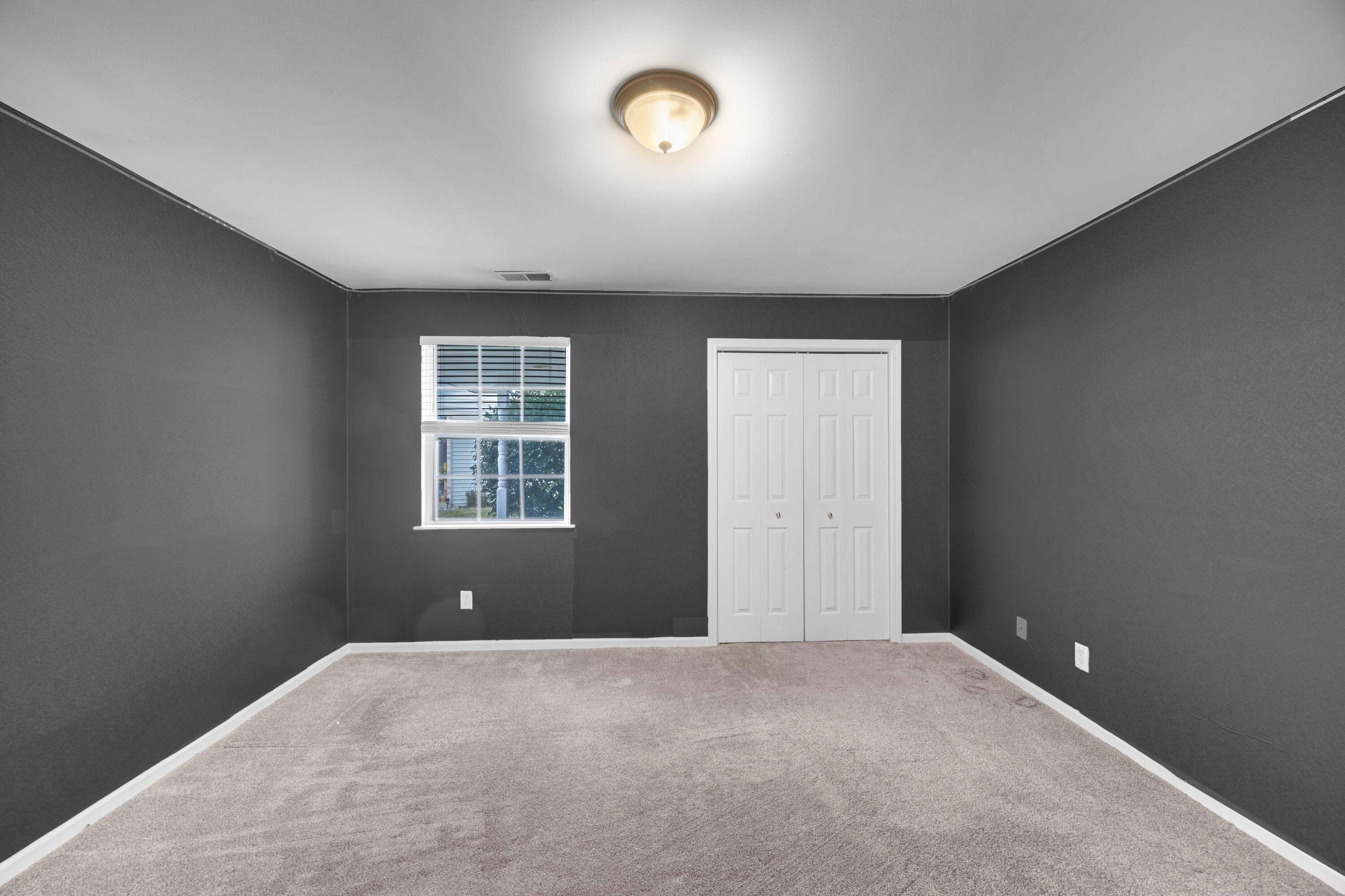 8461 Pierce Street Merrillville, IN 46410 - Photo 16 of 21 a view of an empty room with a window
