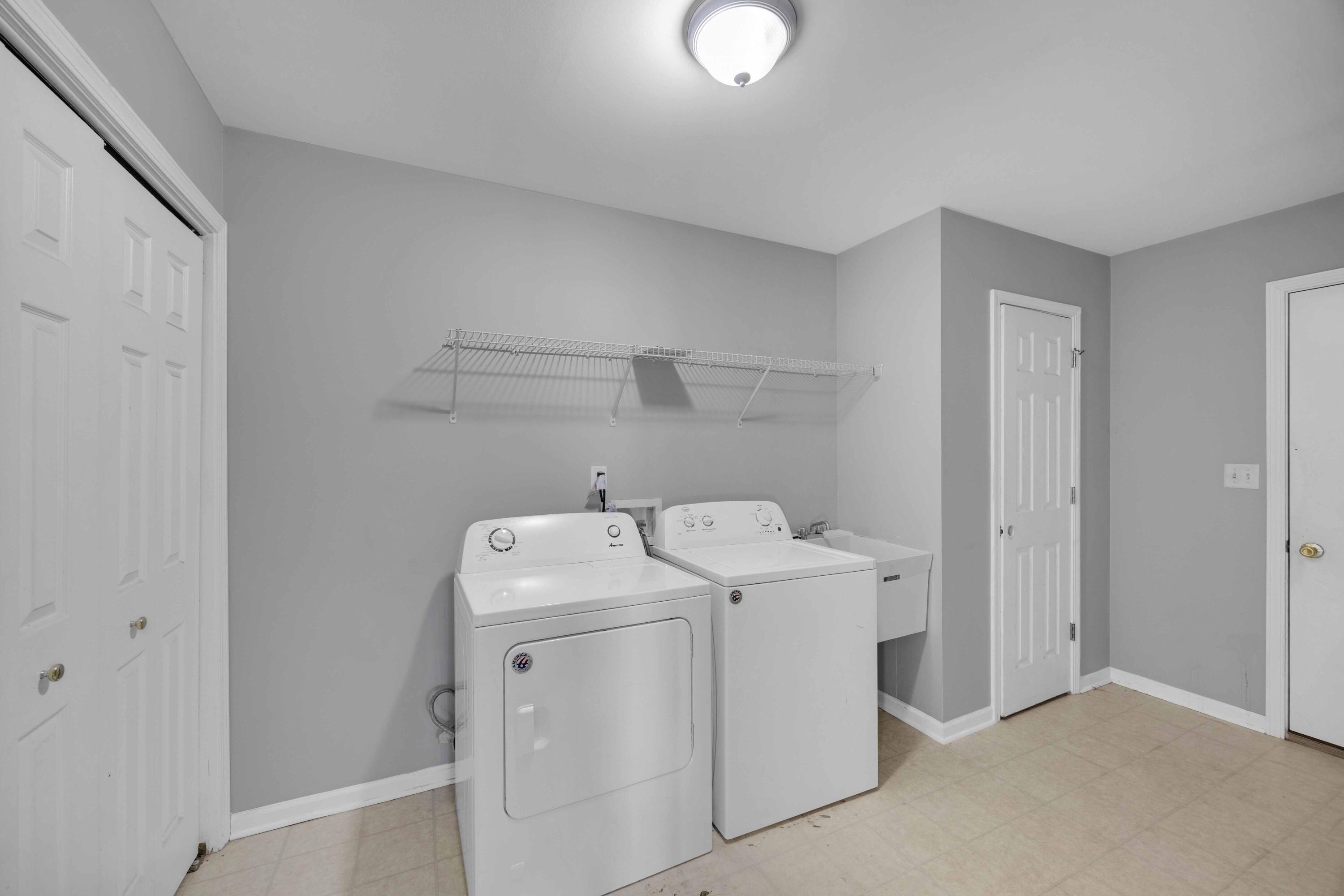 8461 Pierce Street Merrillville, IN 46410 - Photo 18 of 21 a utility room with dryer and washer