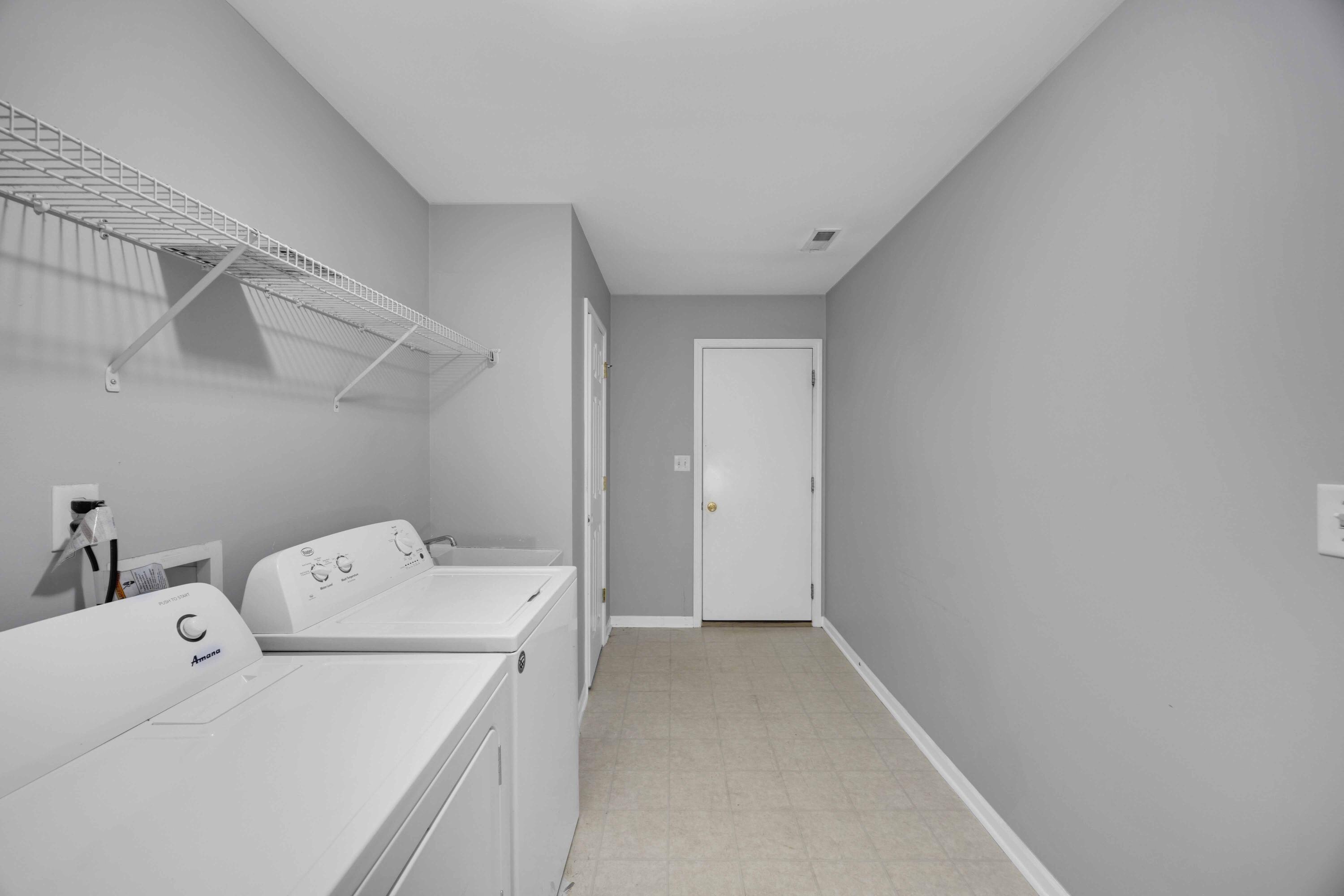 8461 Pierce Street Merrillville, IN 46410 - Photo 19 of 21 a utility room with dryer and washer