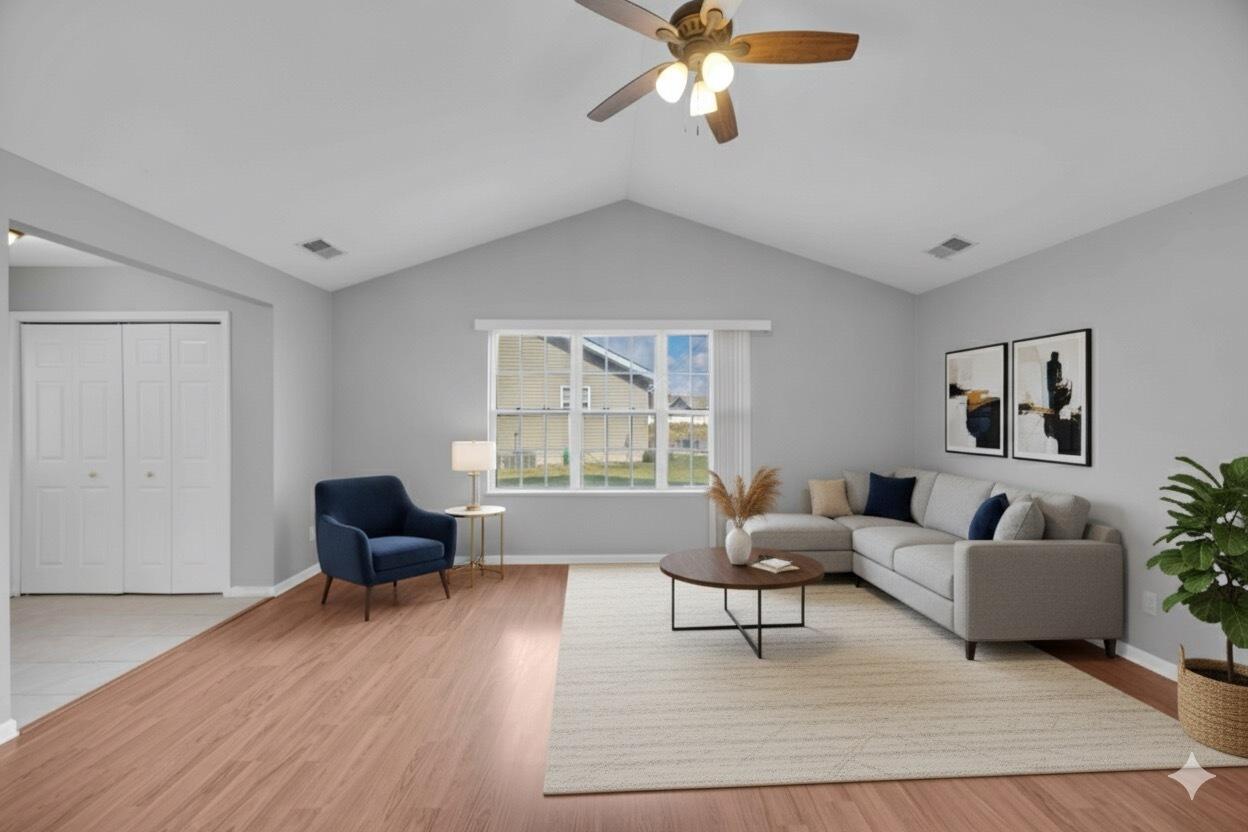 8461 Pierce Street Merrillville, IN 46410 - Photo 3 of 21 a living room with furniture and a large window