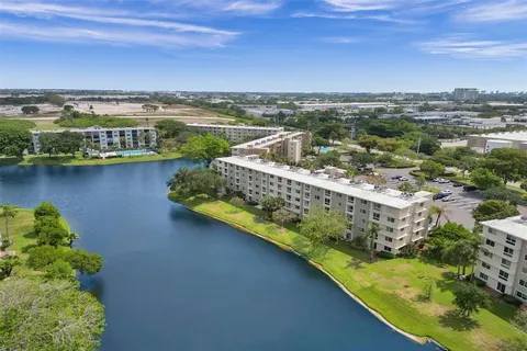 a view of a city with a lake