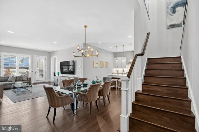 a bathroom with double vanity sinks and a mirror