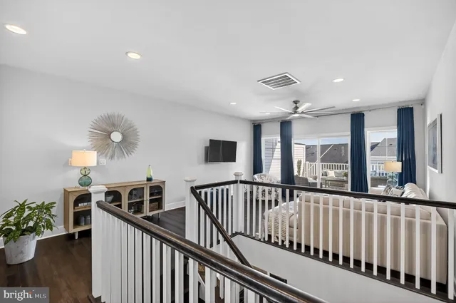 a living room with furniture and window
