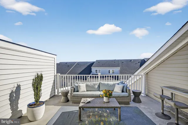 a front view of a house with a porch