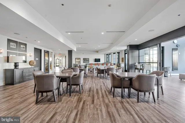 a view of swimming pool with outdoor seating