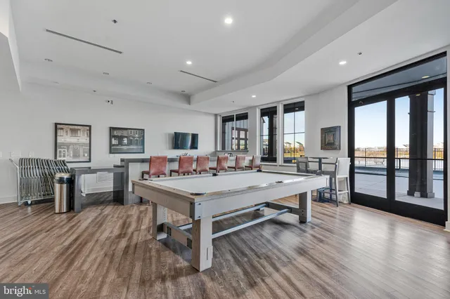 a picture of a bench in front of a building