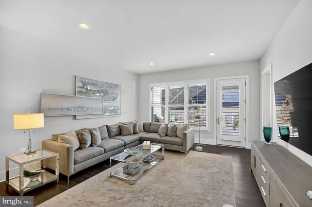 a kitchen with a sink a stove and cabinets
