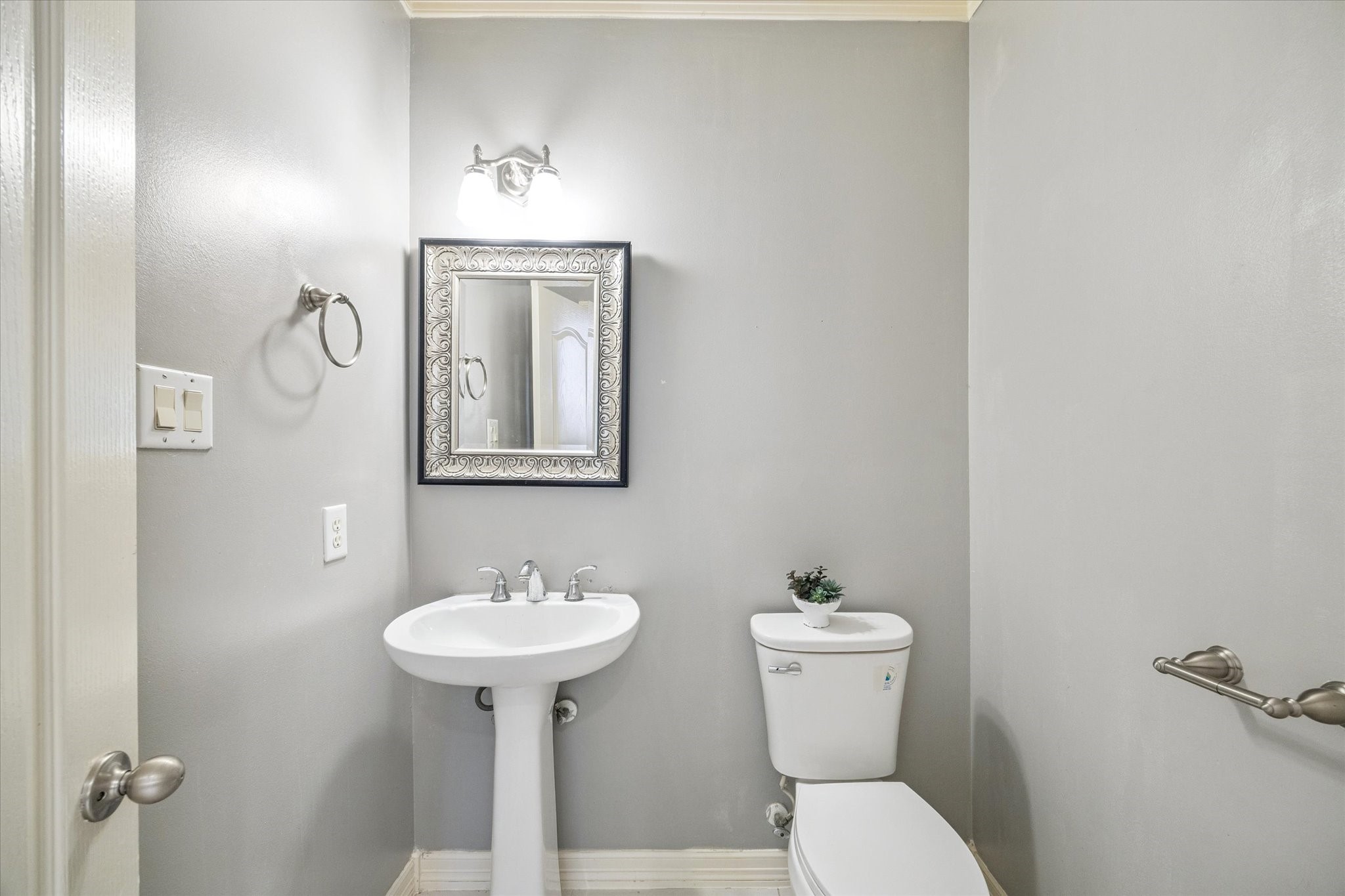 22522 Rippling Shore Court Katy, TX 77494 - Photo 20 of 41 a bathroom with a toilet sink and mirror