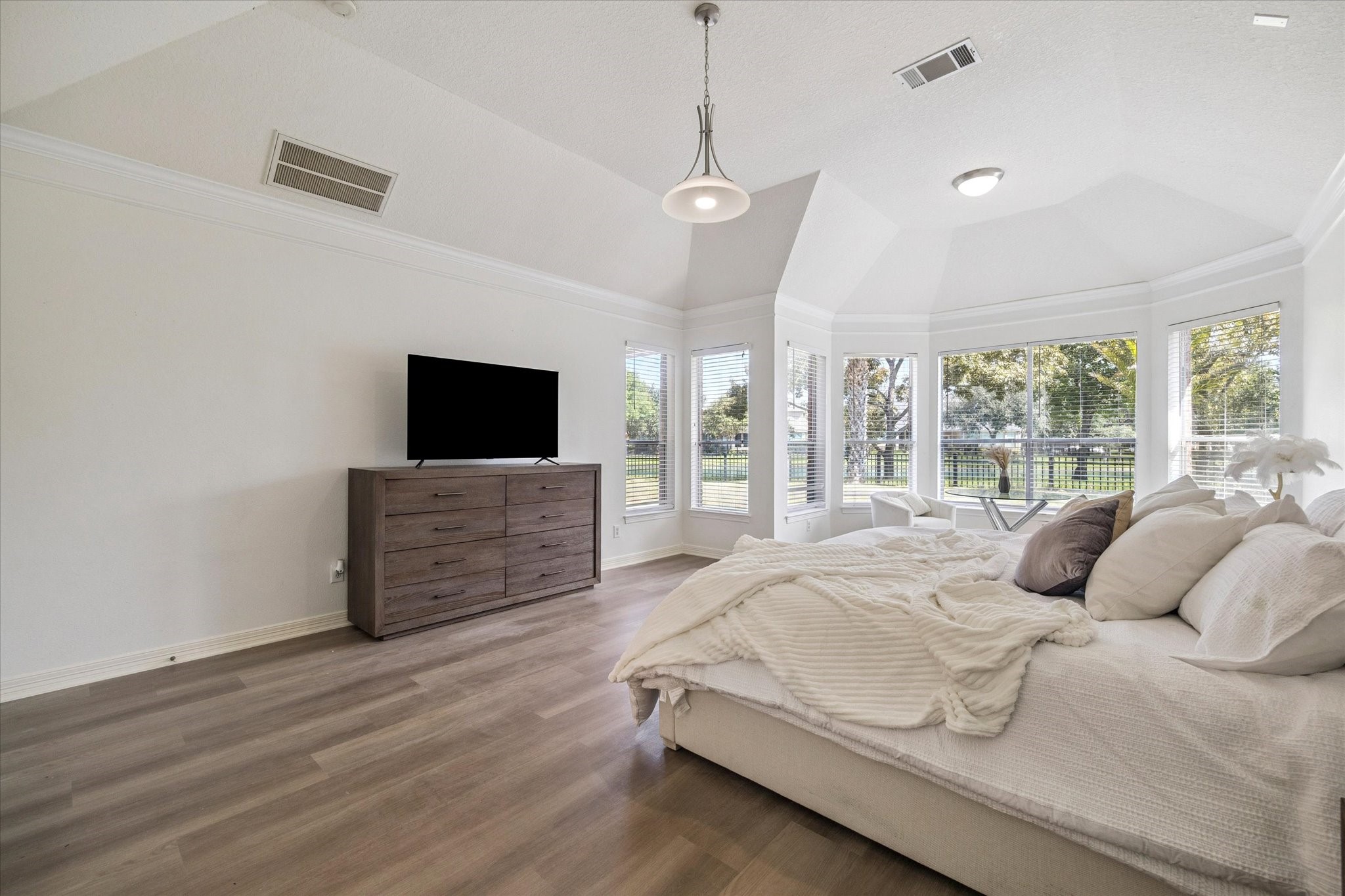 22522 Rippling Shore Court Katy, TX 77494 - Photo 21 of 41 a bedroom with a bed window and a flat screen tv