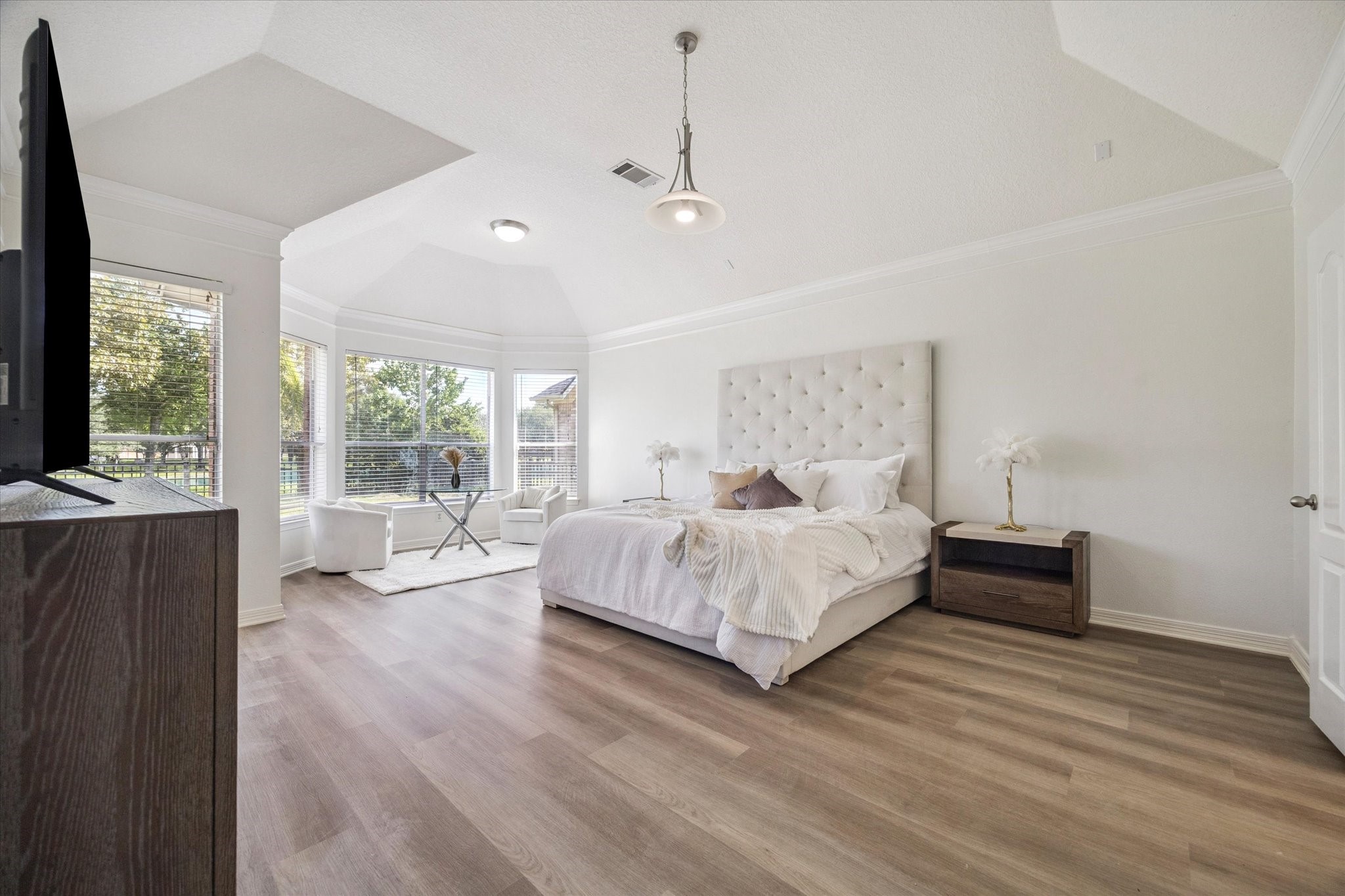 22522 Rippling Shore Court Katy, TX 77494 - Photo 22 of 41 a spacious bedroom with a bed and large windows