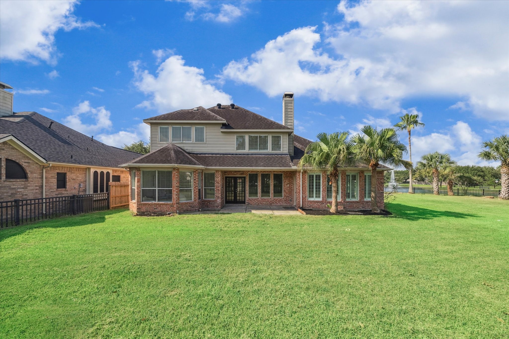 22522 Rippling Shore Court Katy, TX 77494 - Photo 40 of 41 a view of a house with a big yard and a large tree