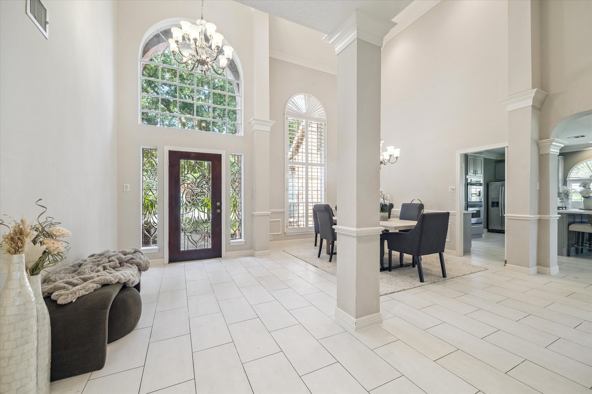22522 Rippling Shore Court Katy, TX 77494 - Photo 7 of 41 a lobby with furniture and floor to ceiling window