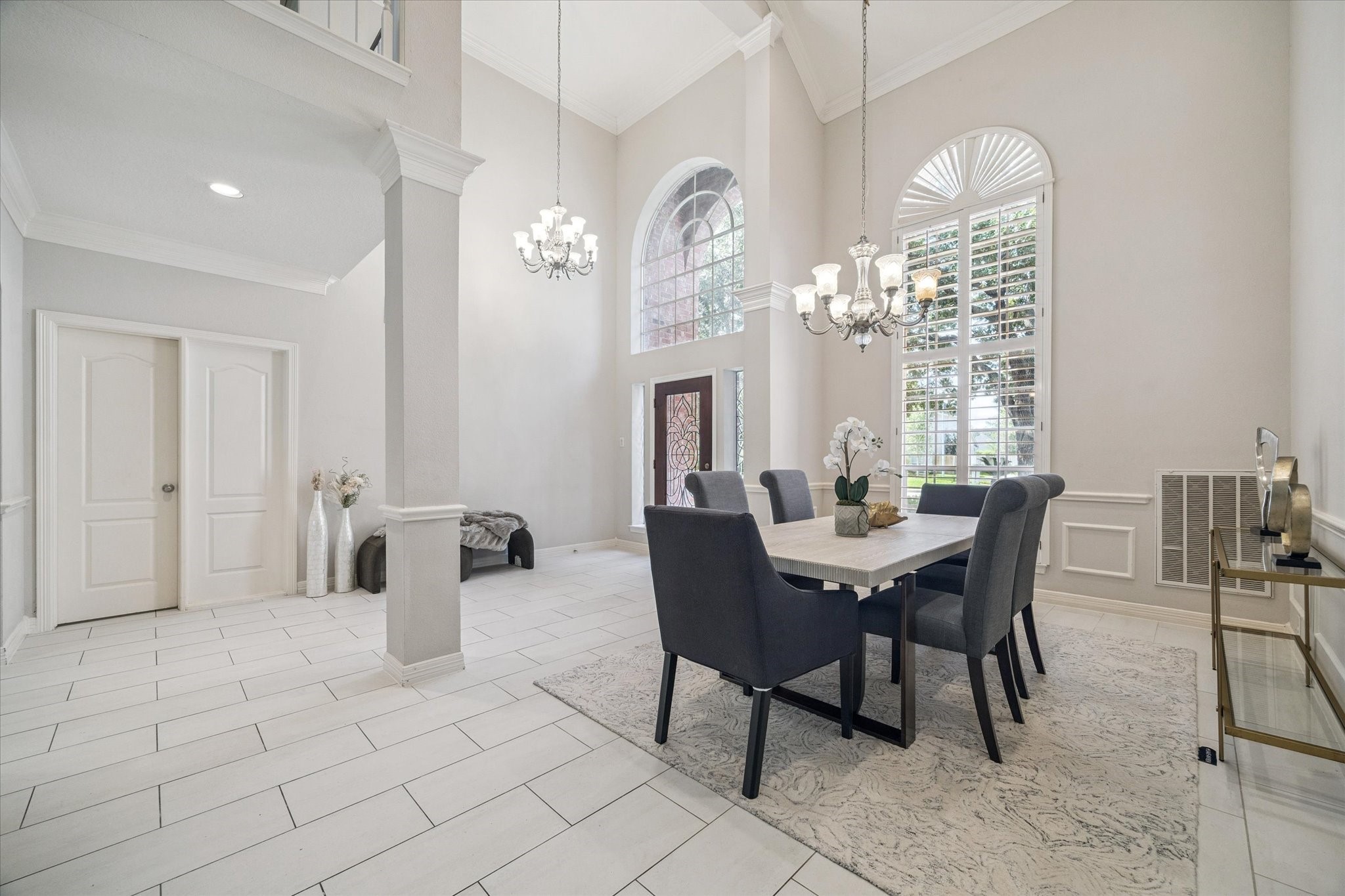 22522 Rippling Shore Court Katy, TX 77494 - Photo 8 of 41 a view of a dining room with furniture and a chandelier