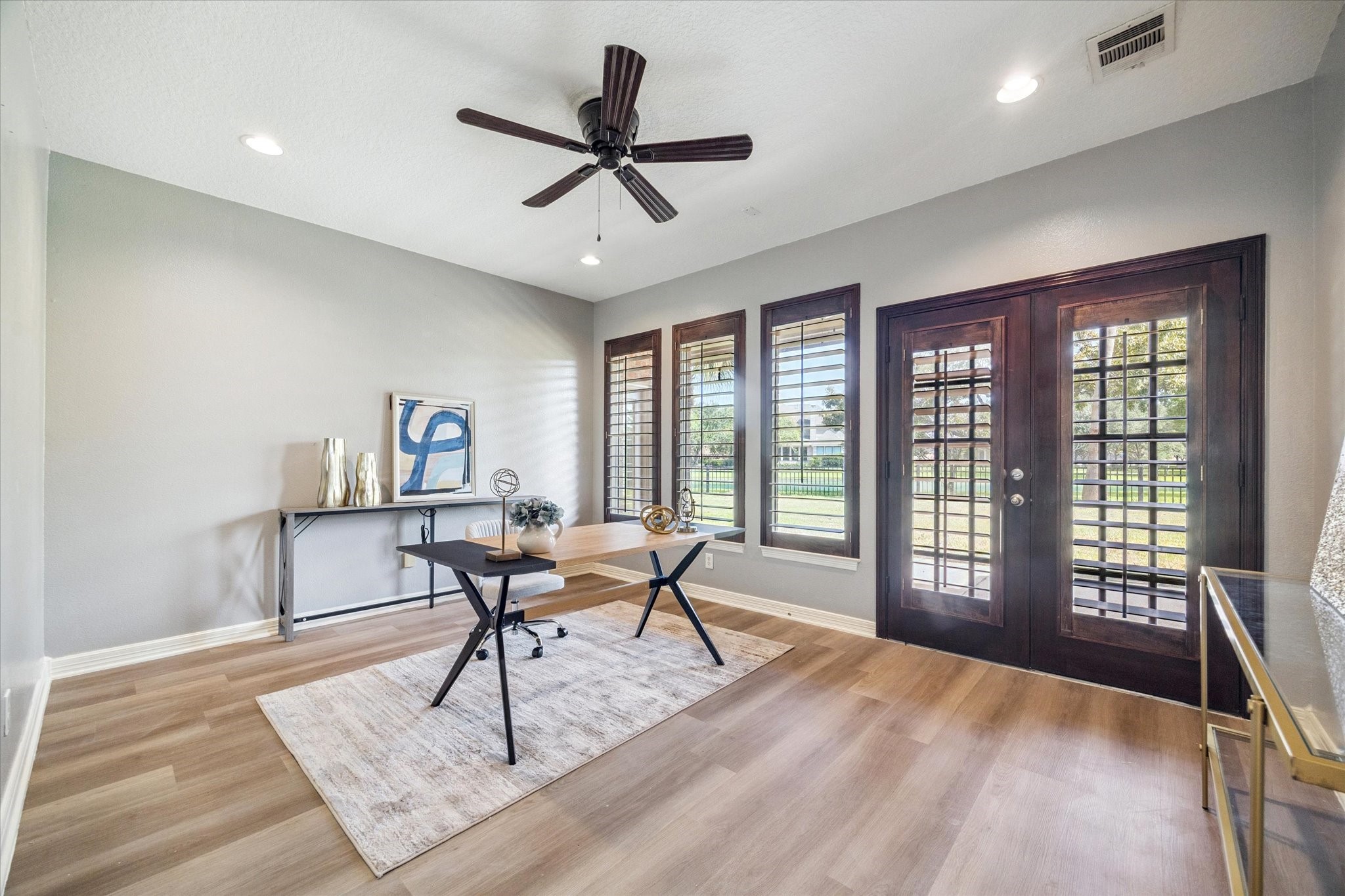 22522 Rippling Shore Court Katy, TX 77494 - Photo 10 of 41 a view of a livingroom with furniture window and wooden floor