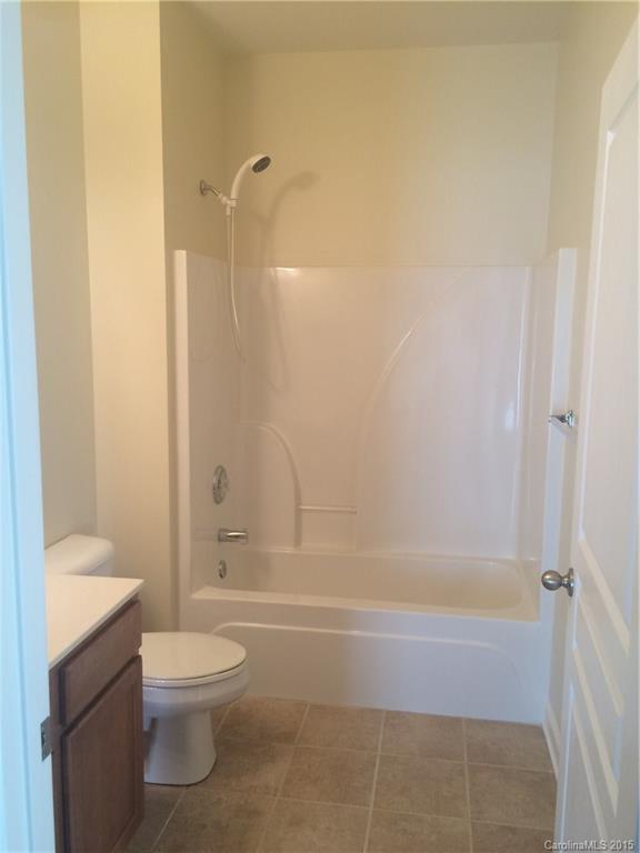 10125 Westmoreland Road, Unit 1B Cornelius, NC 28031 - Photo 11 of 15 a bathroom with a shower