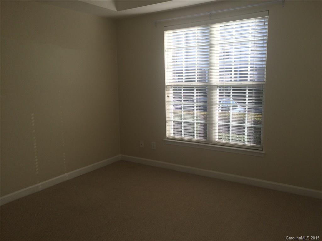 10125 Westmoreland Road, Unit 1B Cornelius, NC 28031 - Photo 10 of 15 a view of a window in an empty room