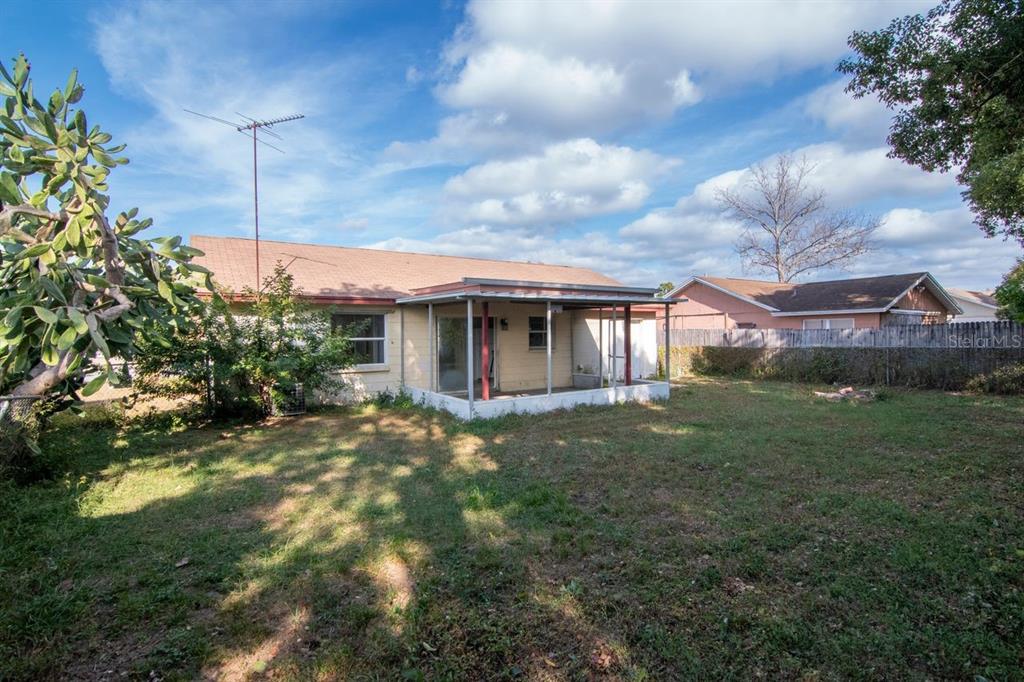 7544 Humboldt Avenue New Port Richey, FL 34655 - Photo 23 of 24 a view of a house with a backyard