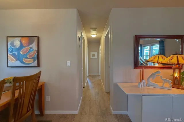 a view of a bathroom with a sink and mirror