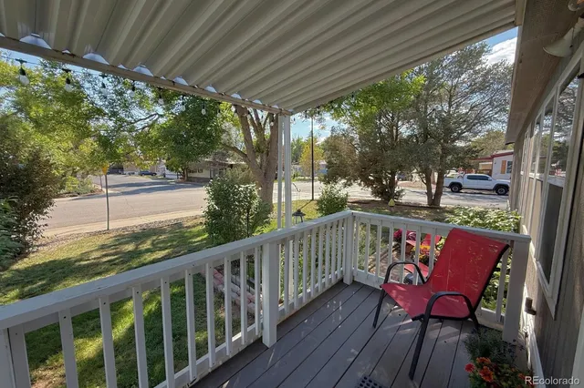a view of a two chairs in the deck