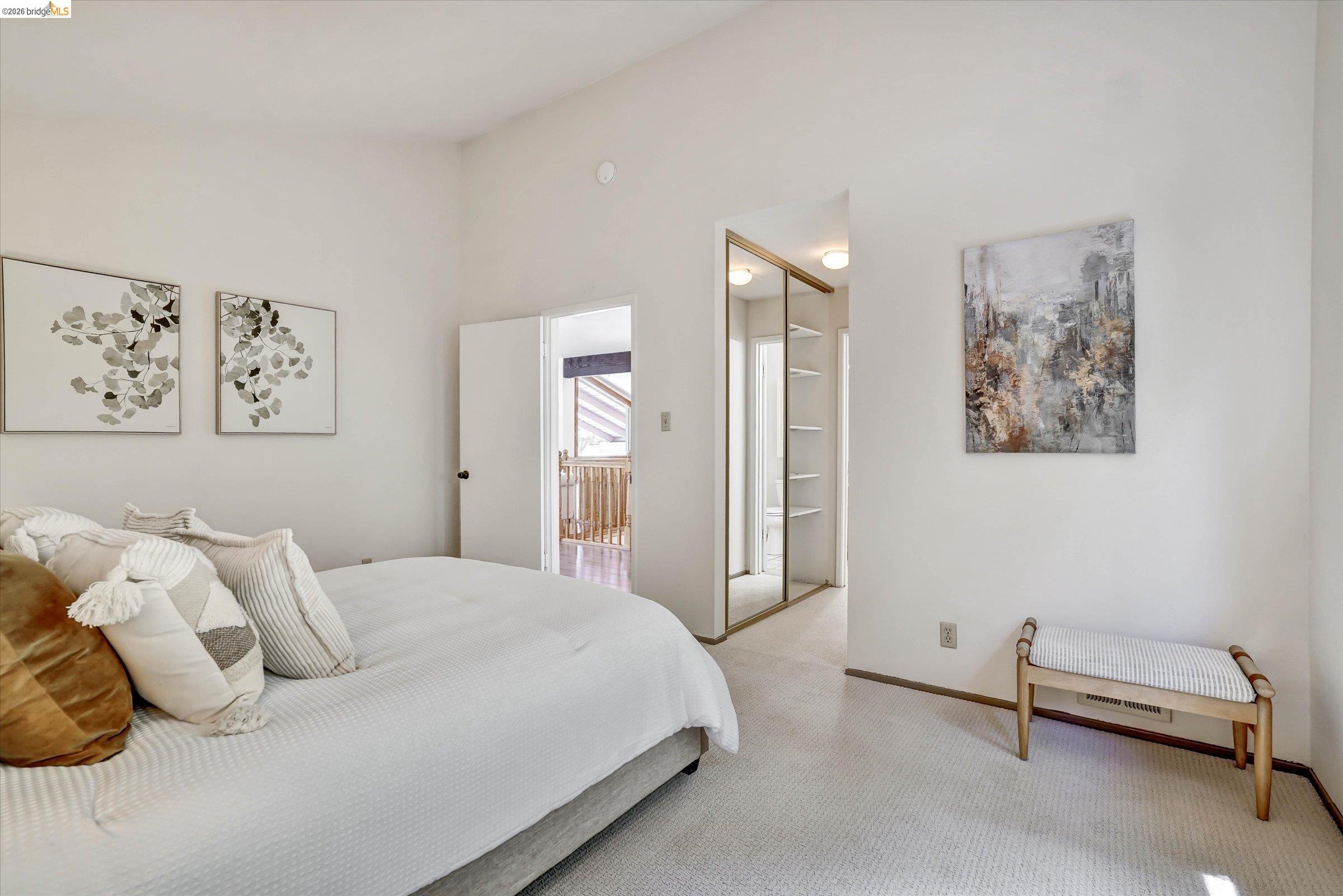2826 Wright Avenue Pinole, CA 94564 - Photo 44 of 70 Vaulted ceiling bedroom featuring plush light-toned carpeting, ample natural light, and mirrored closet doors