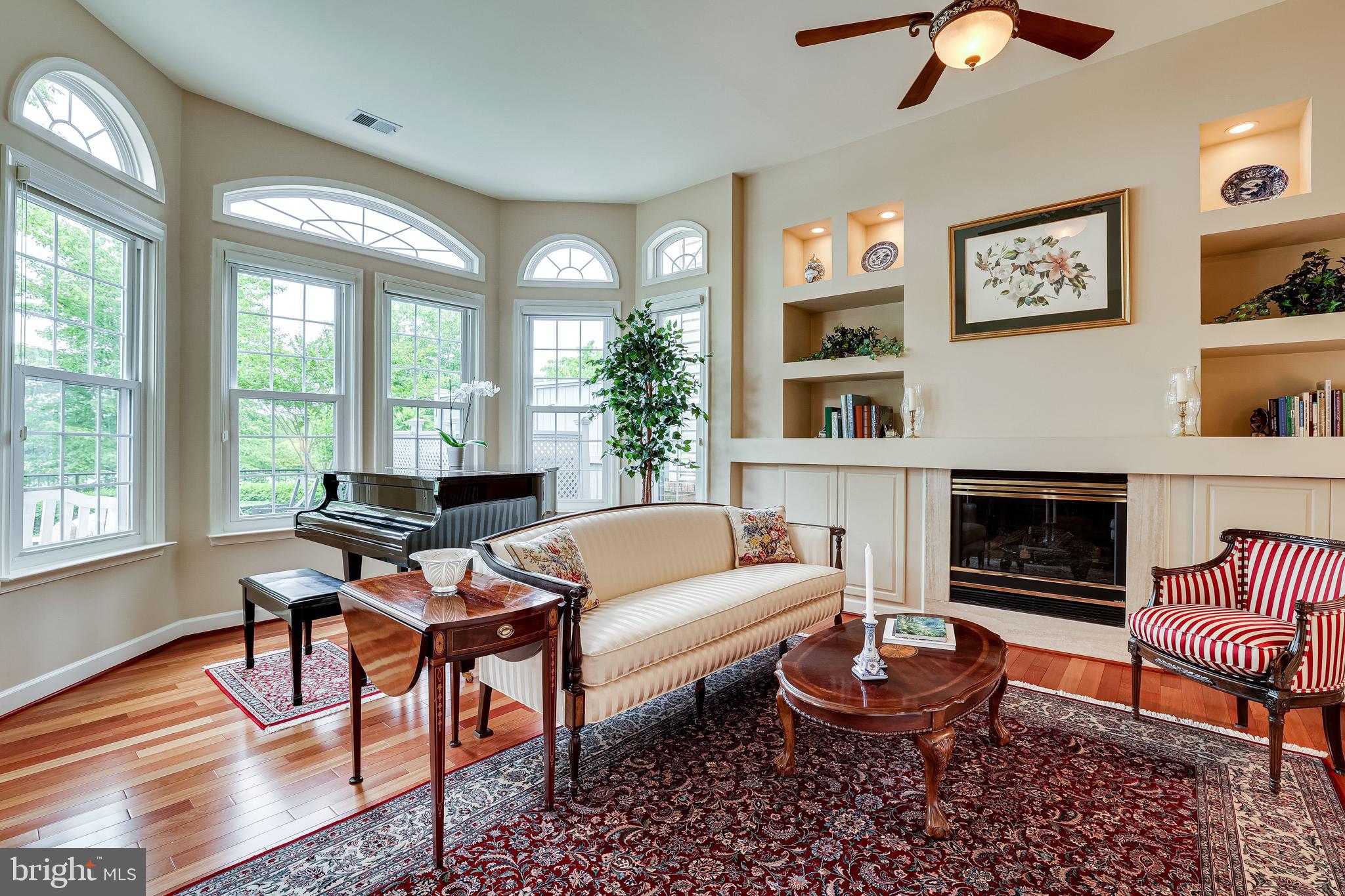 1933 Logan Manor Drive Reston, VA 20190 - Photo 29 of 120 Large Bump Out Bay Window Area with a Baby Grand