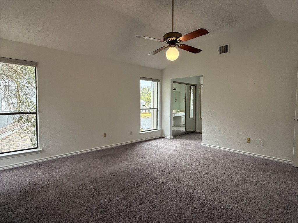 2503 Autrey Drive Leander, TX 78641 - Photo 24 of 39 an empty room with fan and windows