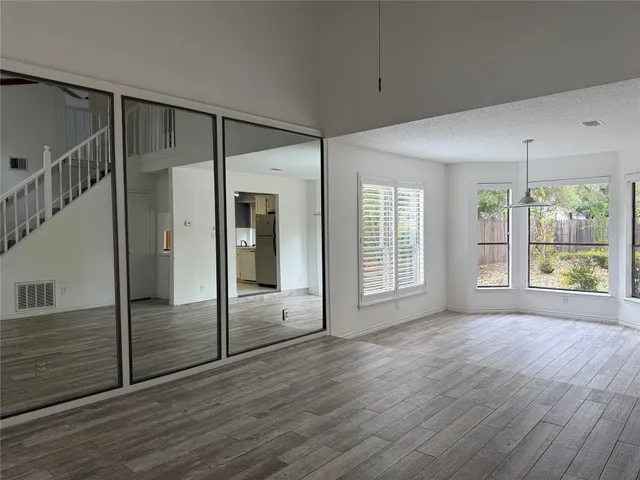 a view of entryway with wooden floor