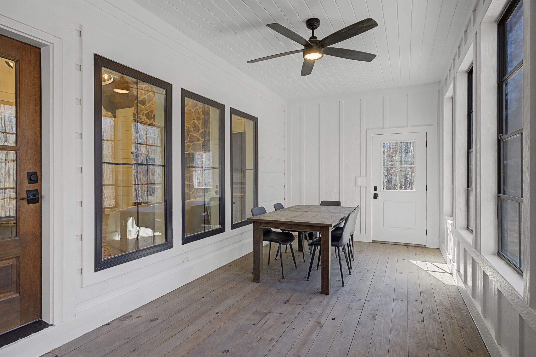 1863 Lake Louisa Loop Monteagle, TN 37356 - Photo 22 of 63 a view of a dining room with furniture window and wooden floor