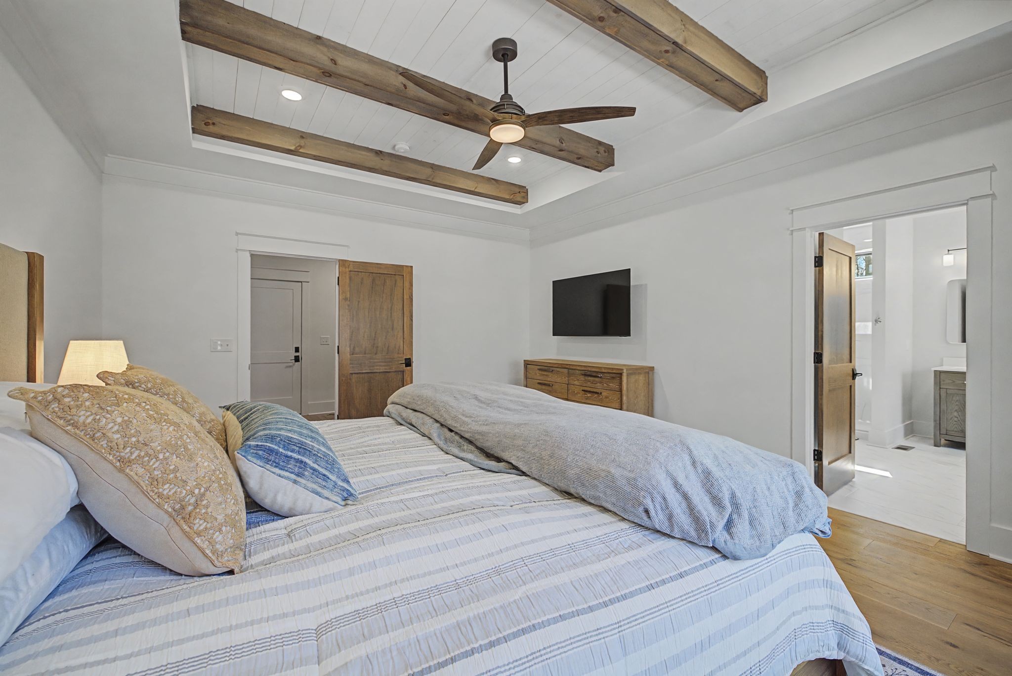 1863 Lake Louisa Loop Monteagle, TN 37356 - Photo 28 of 63 a bedroom with a bed and a flat screen tv
