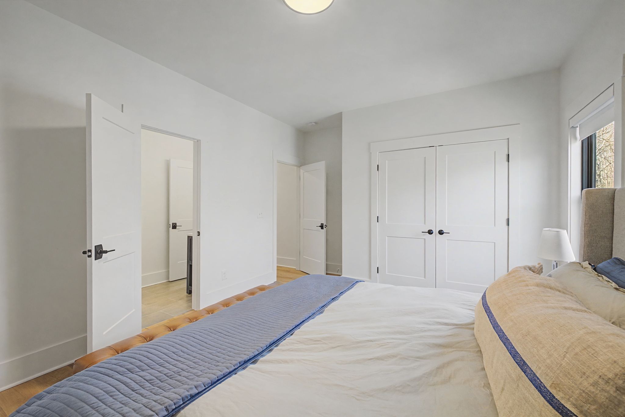 1863 Lake Louisa Loop Monteagle, TN 37356 - Photo 43 of 63 a bedroom with a bed and wooden floor