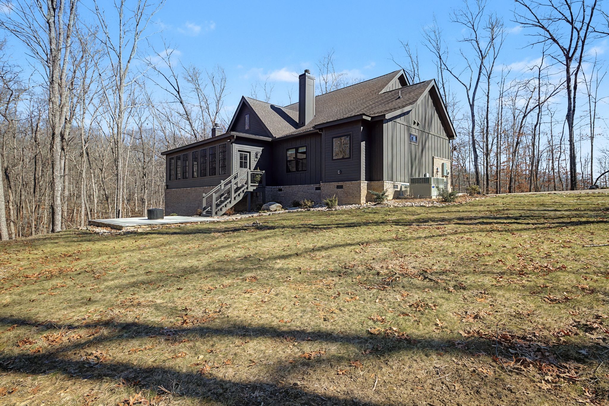 1863 Lake Louisa Loop Monteagle, TN 37356 - Photo 44 of 63 a front view of a house with a yard