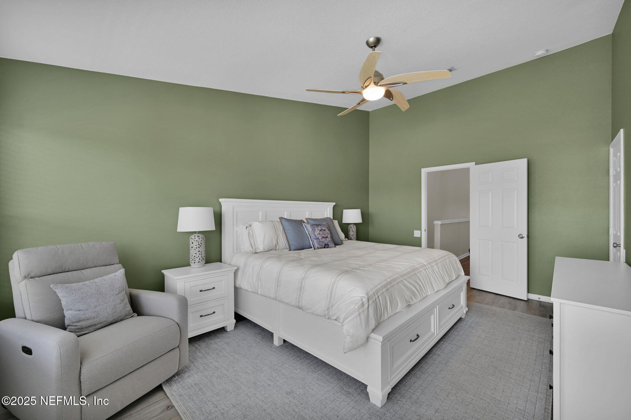 7990 Baymeadows Road East, Unit 2302 Jacksonville, FL 32256 - Photo 31 of 66 a bedroom with a bed and a couch