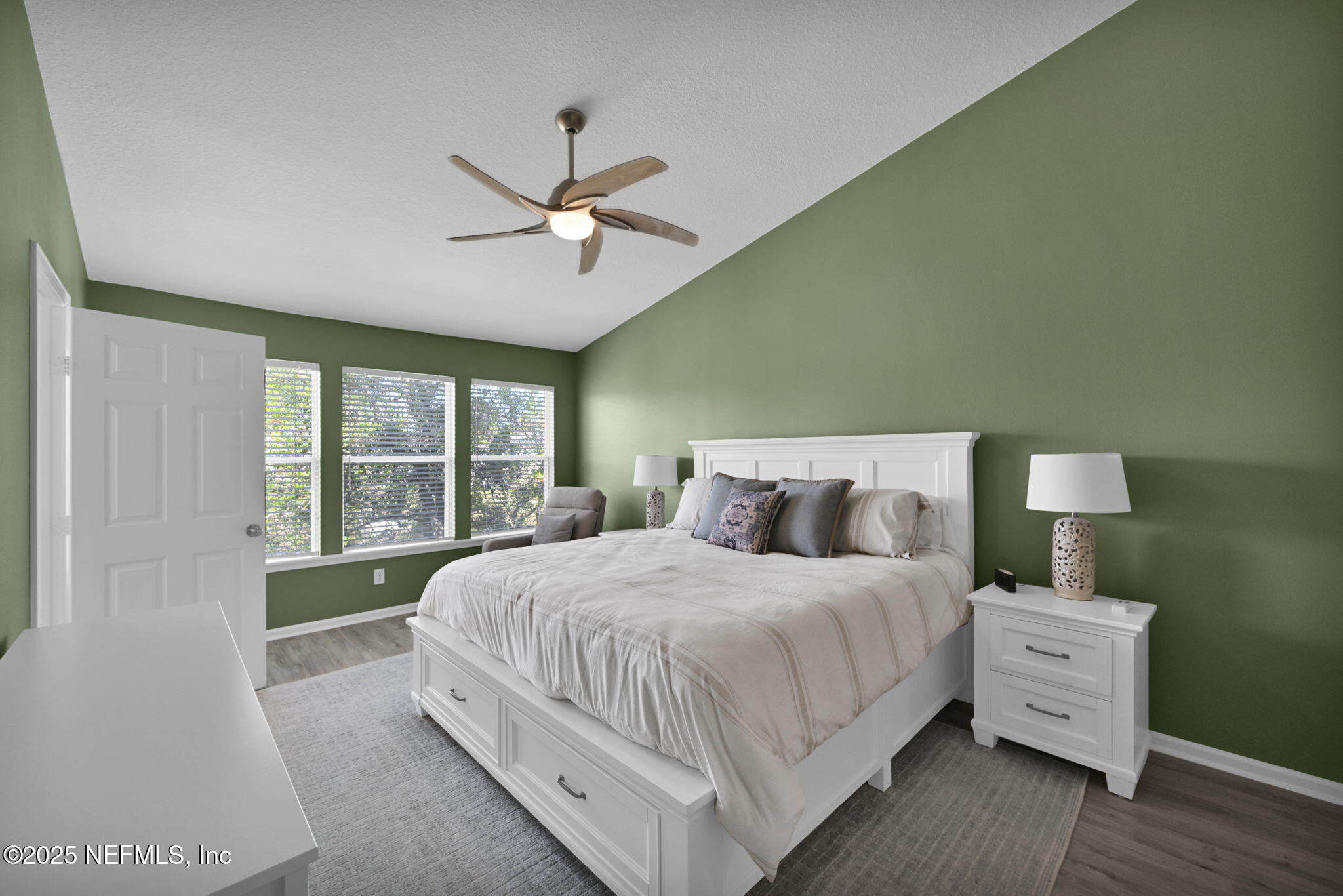 7990 Baymeadows Road East, Unit 2302 Jacksonville, FL 32256 - Photo 36 of 66 a bedroom with a large bed and a window