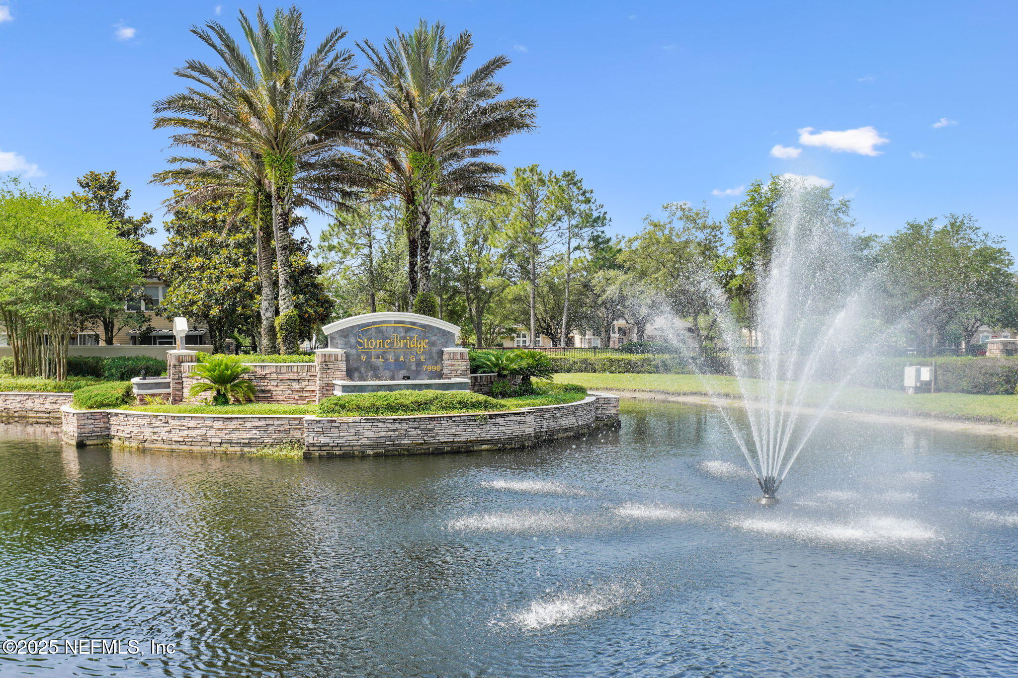 7990 Baymeadows Road East, Unit 2302 Jacksonville, FL 32256 - Photo 43 of 66 a view of a swimming pool with a yard