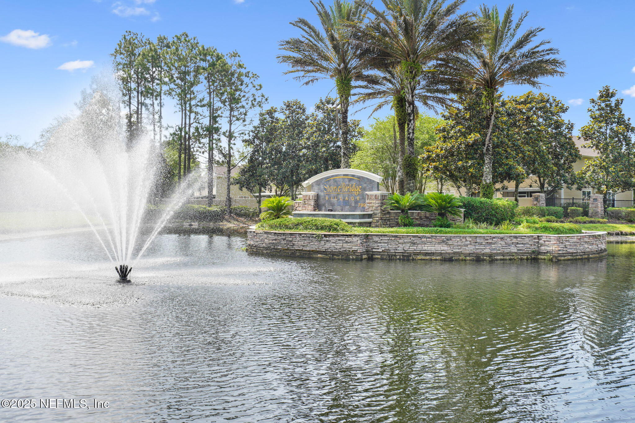 7990 Baymeadows Road East, Unit 2302 Jacksonville, FL 32256 - Photo 44 of 66 a view of a lake with a house in the background