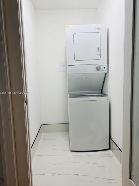 14720 Southwest 107th Terrace Miami, FL 33196 - Photo 14 of 18 a utility room with a washer and dryer