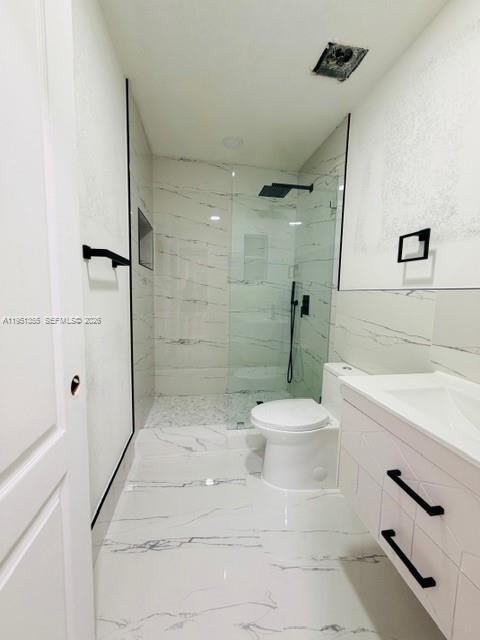 14720 Southwest 107th Terrace Miami, FL 33196 - Photo 6 of 18 a bathroom with a toilet sink and shower
