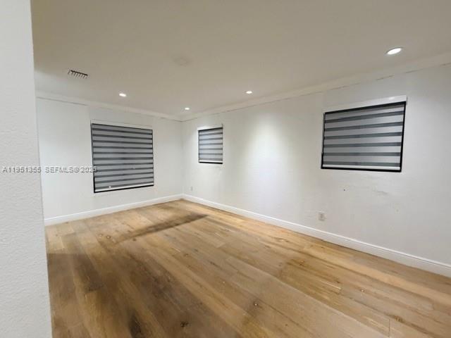 14720 Southwest 107th Terrace Miami, FL 33196 - Photo 10 of 18 a view of an empty room with a window