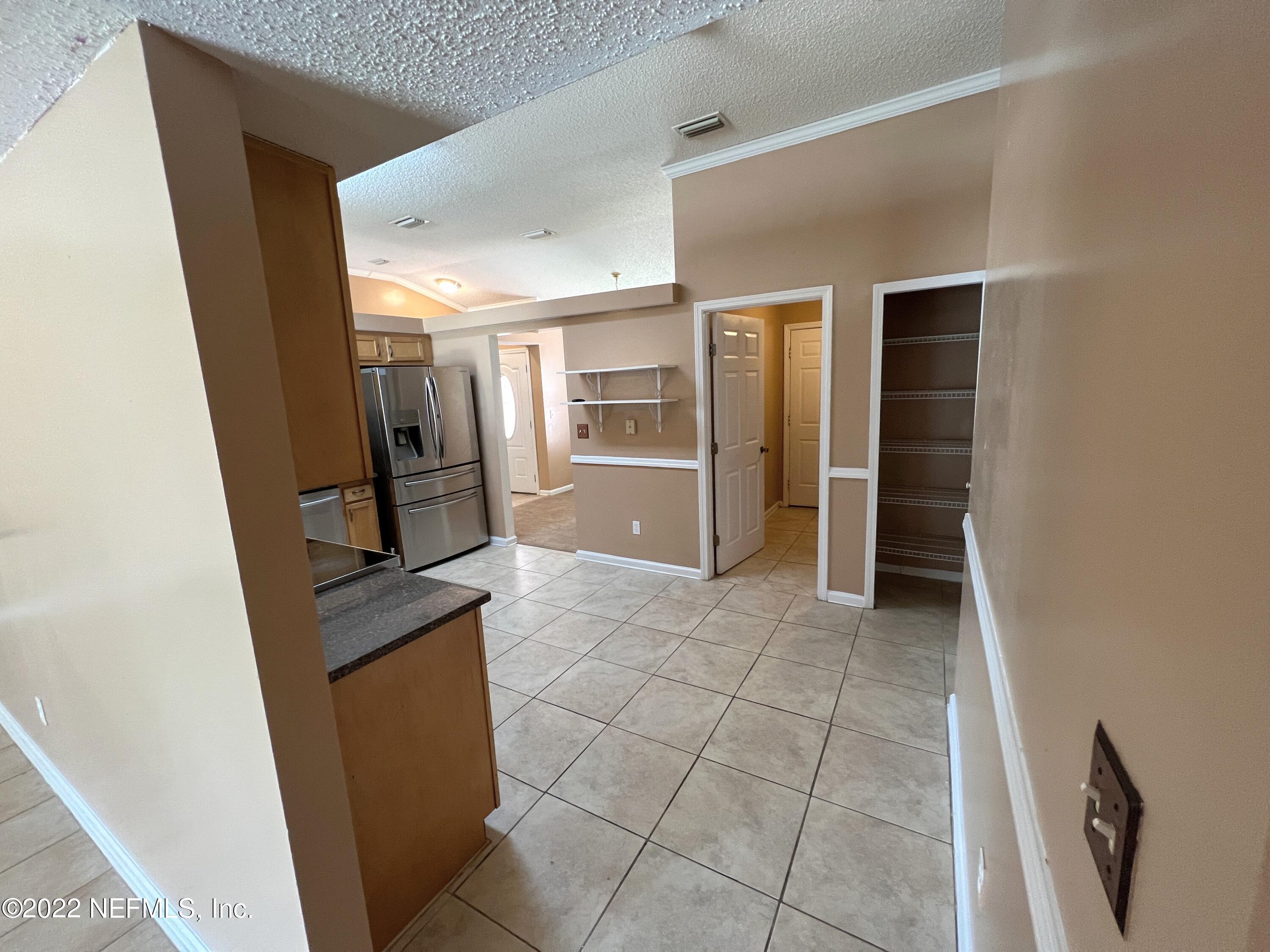 3742 Star Leaf Road West Jacksonville, FL 32210 - Photo 13 of 39 a view of a storage & utility room