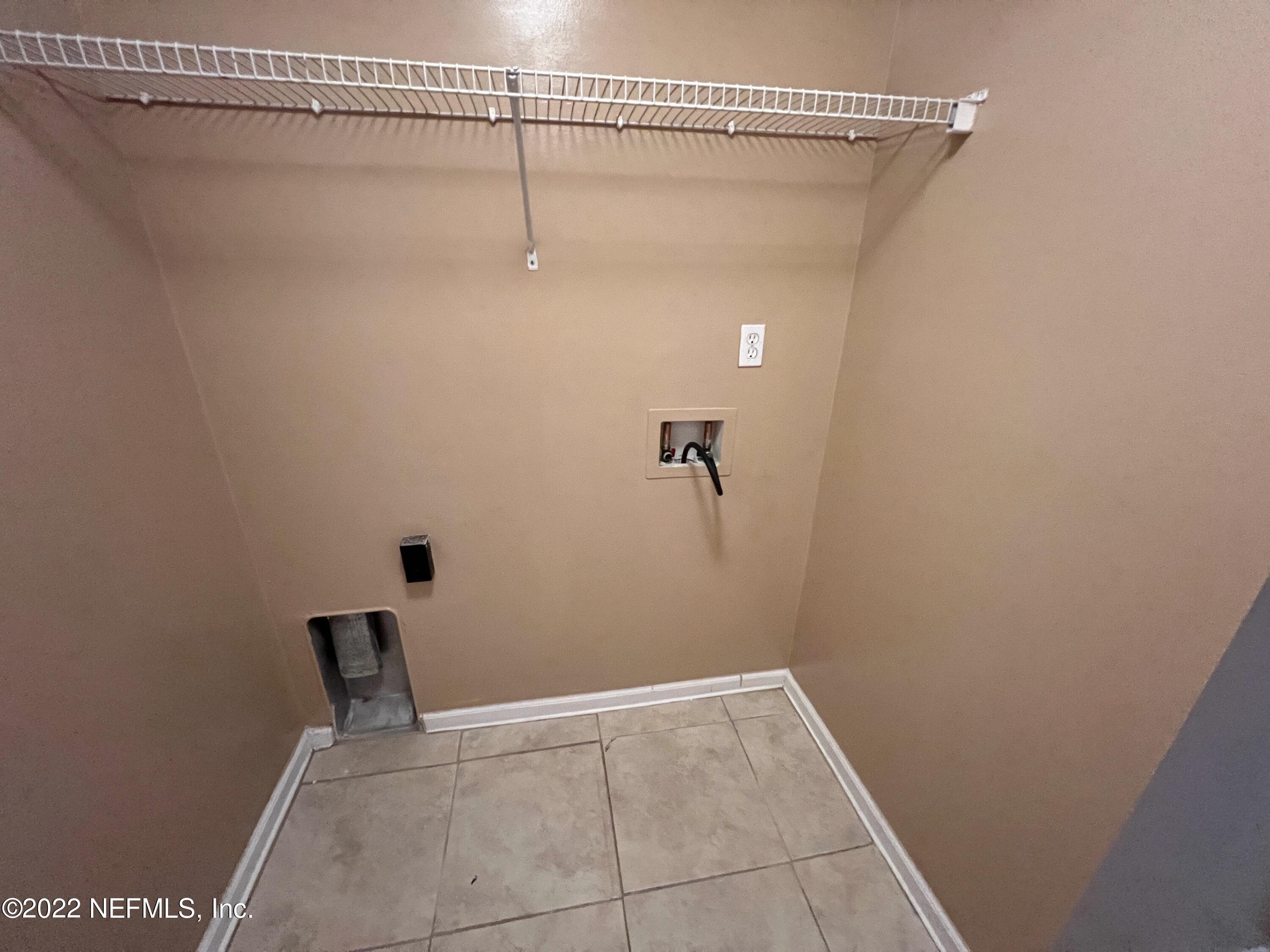 3742 Star Leaf Road West Jacksonville, FL 32210 - Photo 35 of 39 a view of a room with racks on the wall