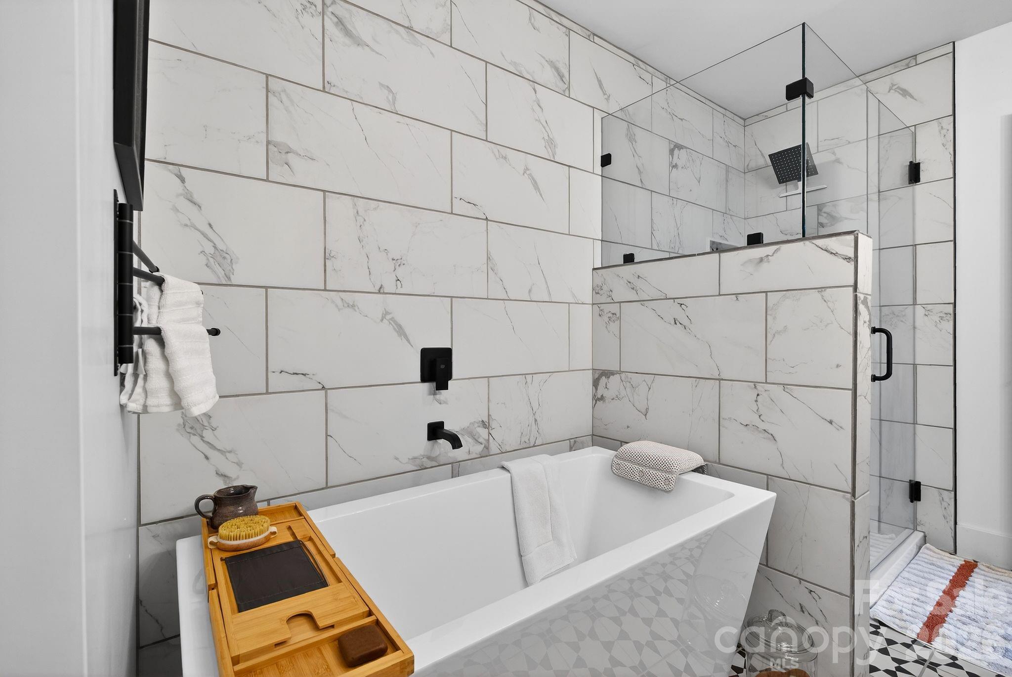 20 Bethesda Road Asheville, NC 28805 - Photo 16 of 30 a bathroom with a tub