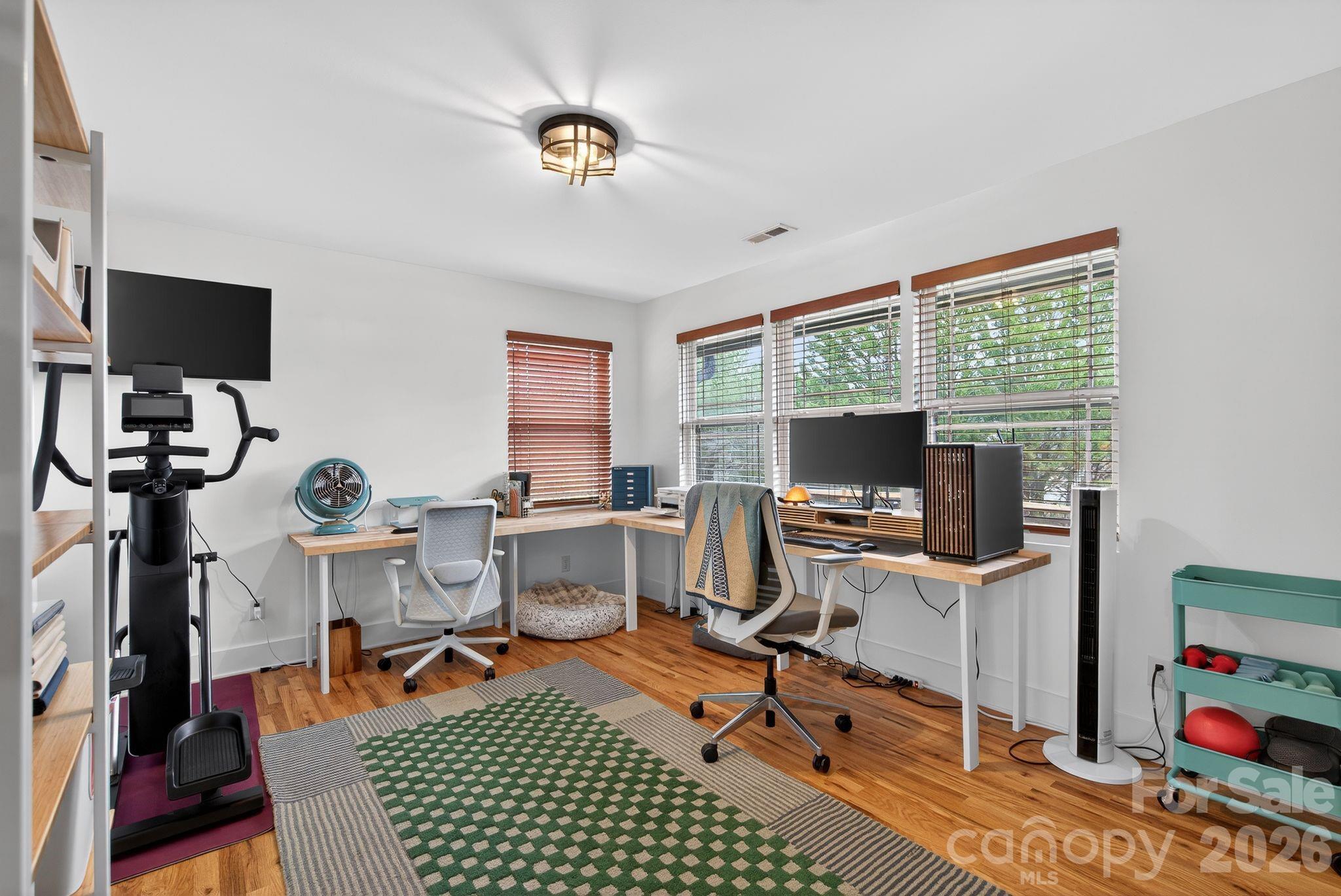 20 Bethesda Road Asheville, NC 28805 - Photo 19 of 30 a view of a workspace with furniture and a window