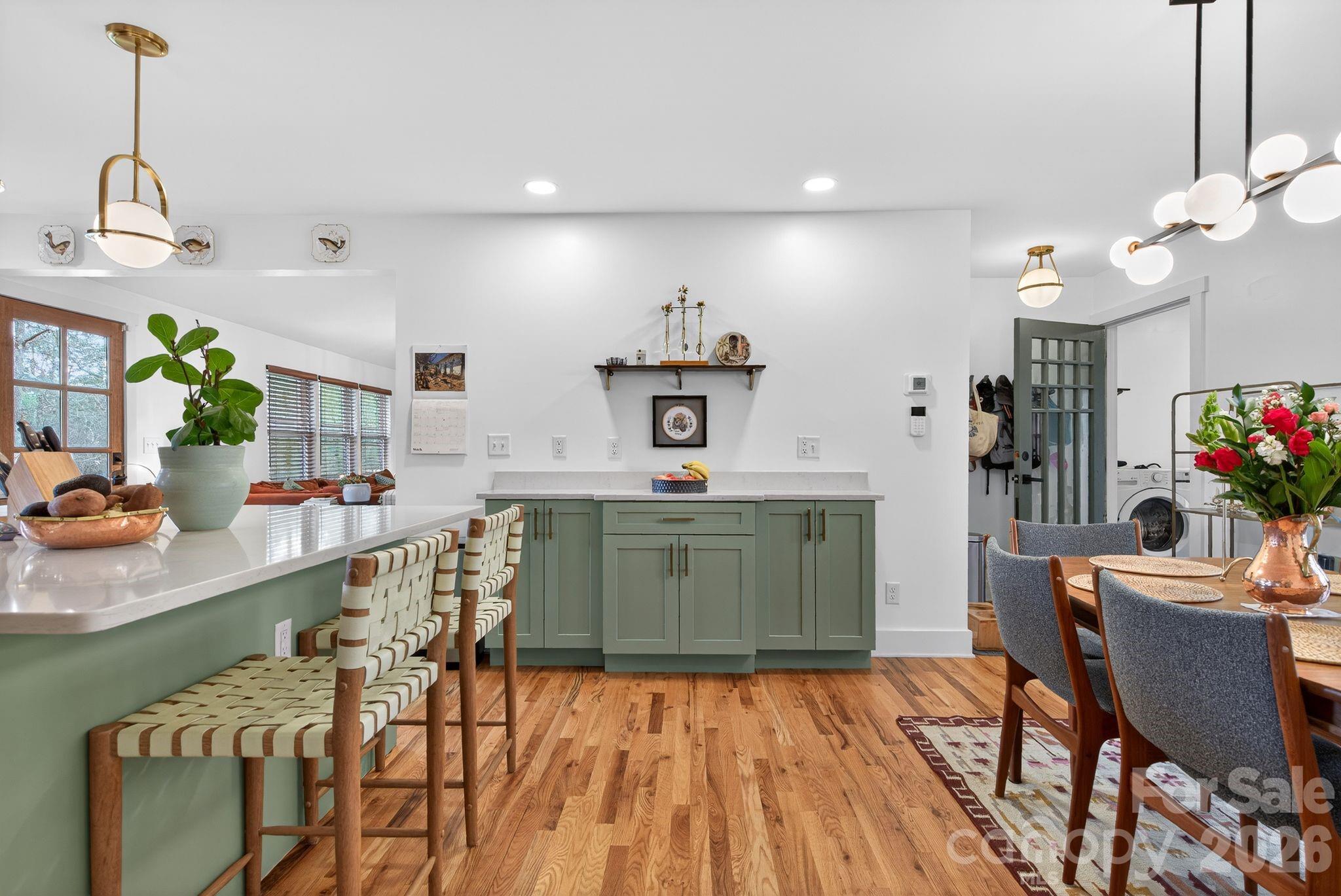 20 Bethesda Road Asheville, NC 28805 - Photo 6 of 30 a view of a dining room with furniture and wooden floor