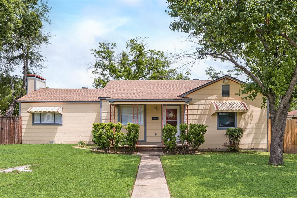 1104 Trinity View Street Irving, TX 75060 - Photo 2 of 34 a front view of house with yard and green space