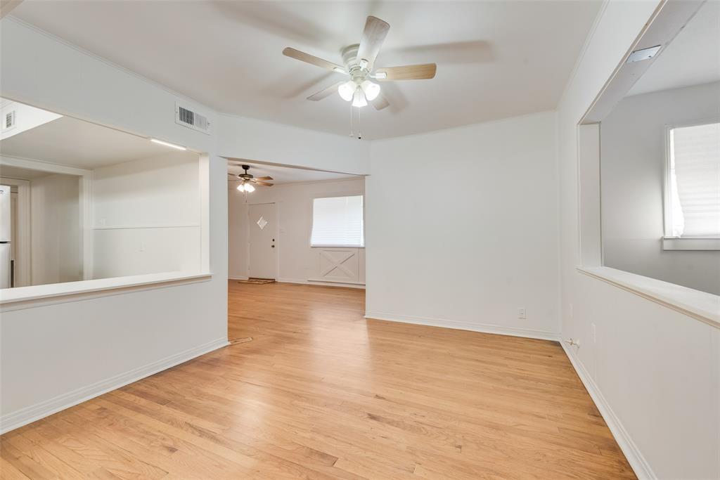 1104 Trinity View Street Irving, TX 75060 - Photo 10 of 34 wooden floor in an empty room with a window