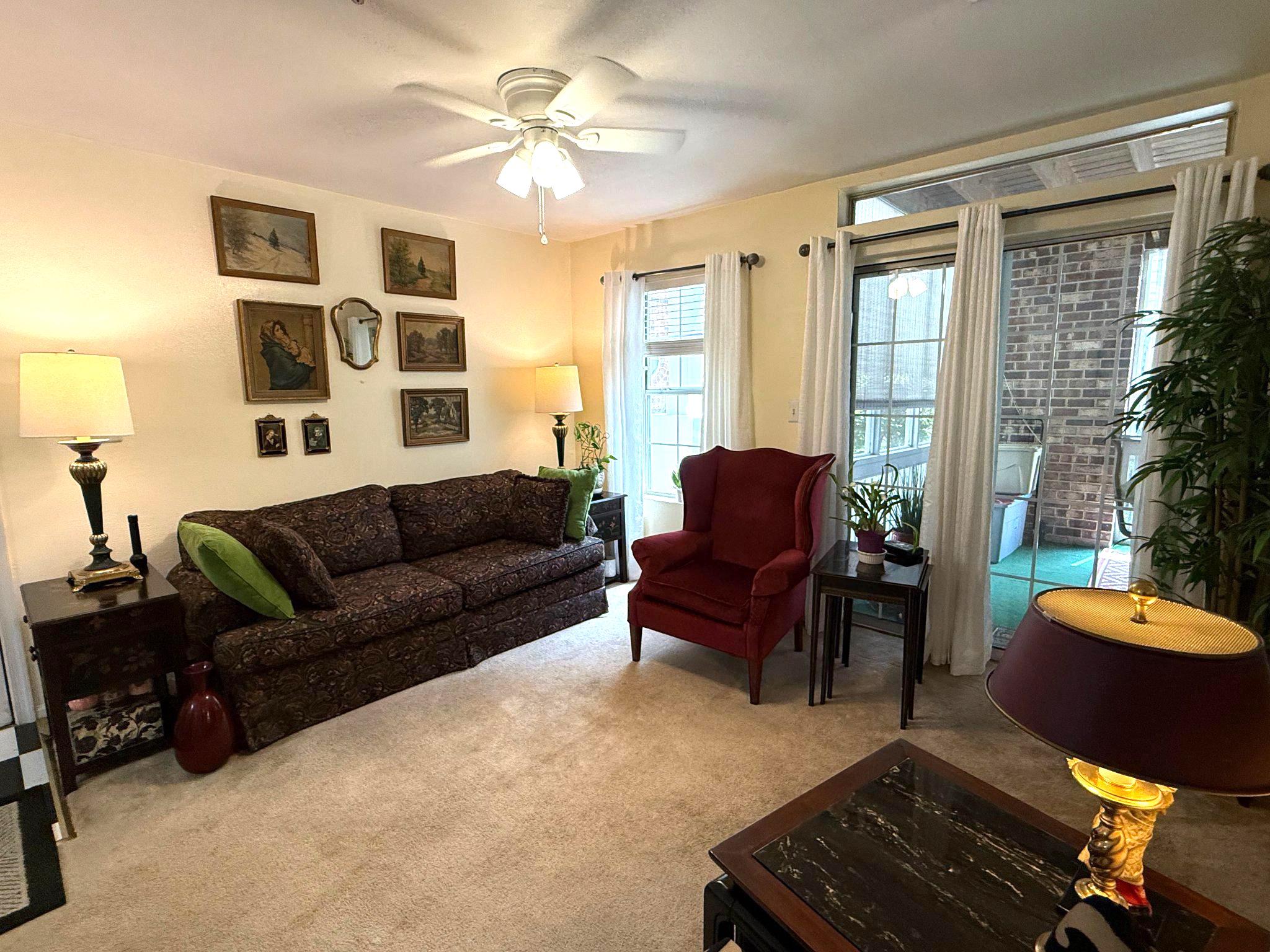 302 Canterbury Road, Unit 302E Bel Air, MD 21014 - Photo 11 of 39 a living room with furniture and a window