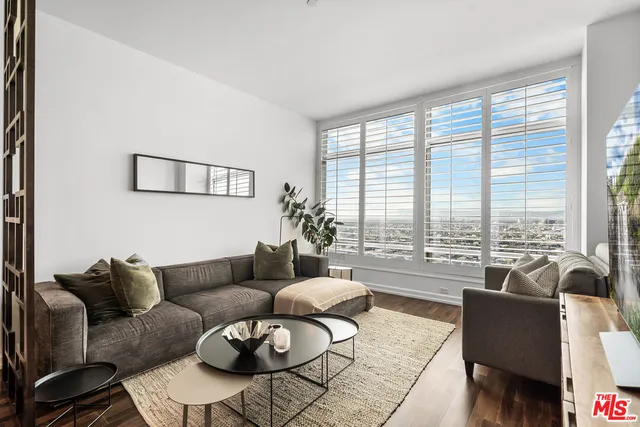 a living room with furniture and a couch