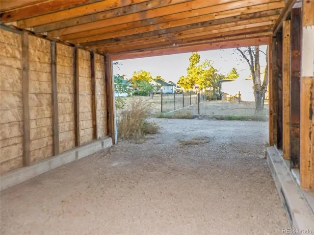 a view of a backyard of the house