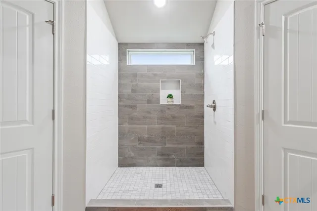 a view of bathroom with shower